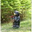 Statue de jardin ours tenant une pancarte de bienvenue