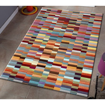 Tapis géométrique en polyester tissé à plat à la main Daliylah en brun / rouge / orange