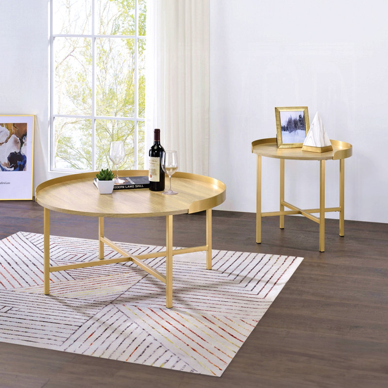 Table basse à plateau rond en chêne et or