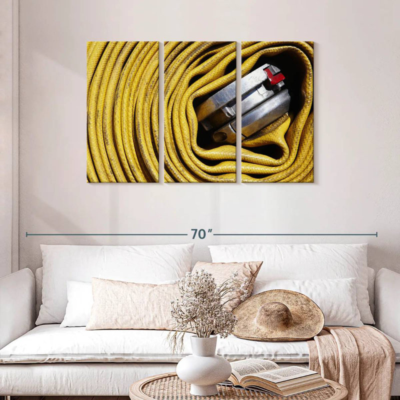 Alcaraz Coiled Fire Hose, 28" H x 45" W