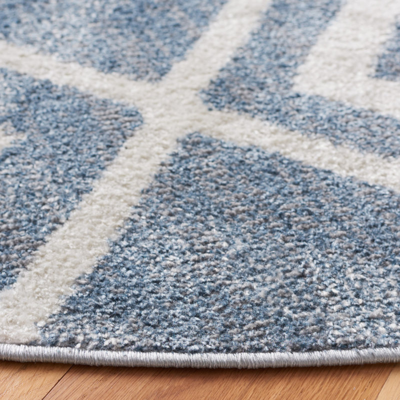 Tapis lavable Blair 228 bleu / ivoire, Rond 6 pi 7 po