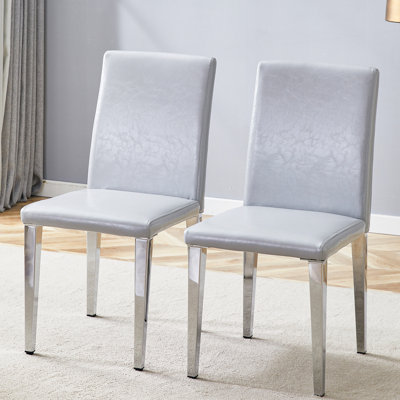 Deux chaises de salle à manger en polyuréthane gris clair (seulement les chaises)