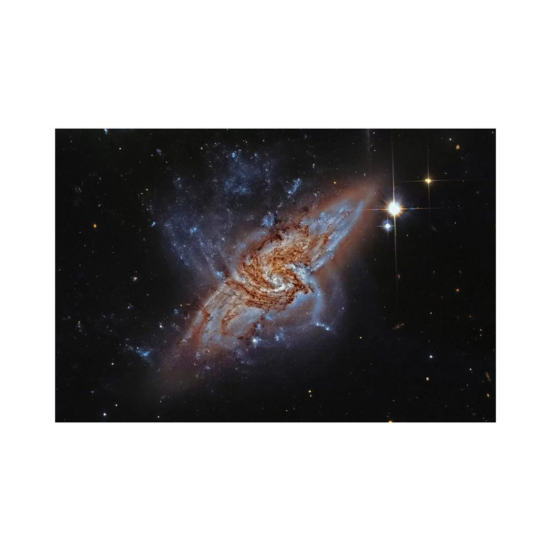 A Pair Of Overlapping Spiral Galaxies (NGC 3314) by Roberto Colombari - Wrapped Canvas Print