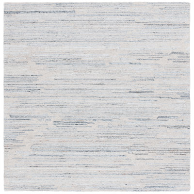 Quintyn Abstract Hand Tufted Performance Abstract Rug