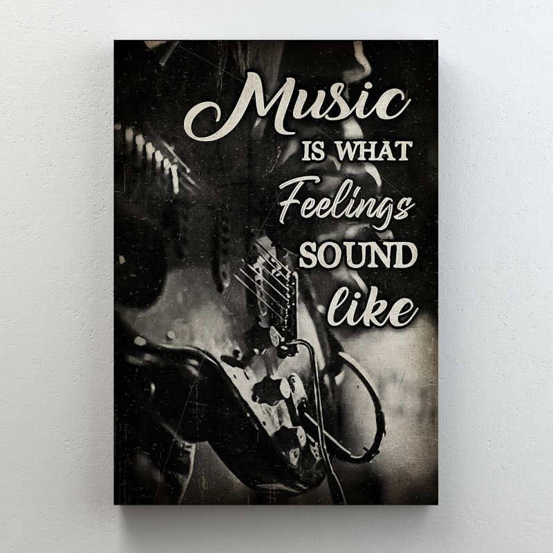 «Guitare sur fond noir - Music Is What Feelings Sound Like», reproduction d'art graphique sur toile tendue