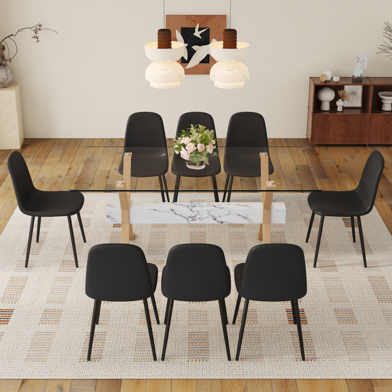 Table de salle à manger transparente en verre trempé avec 8 chaises et pieds en métal. Grande table avec pieds en X en métal