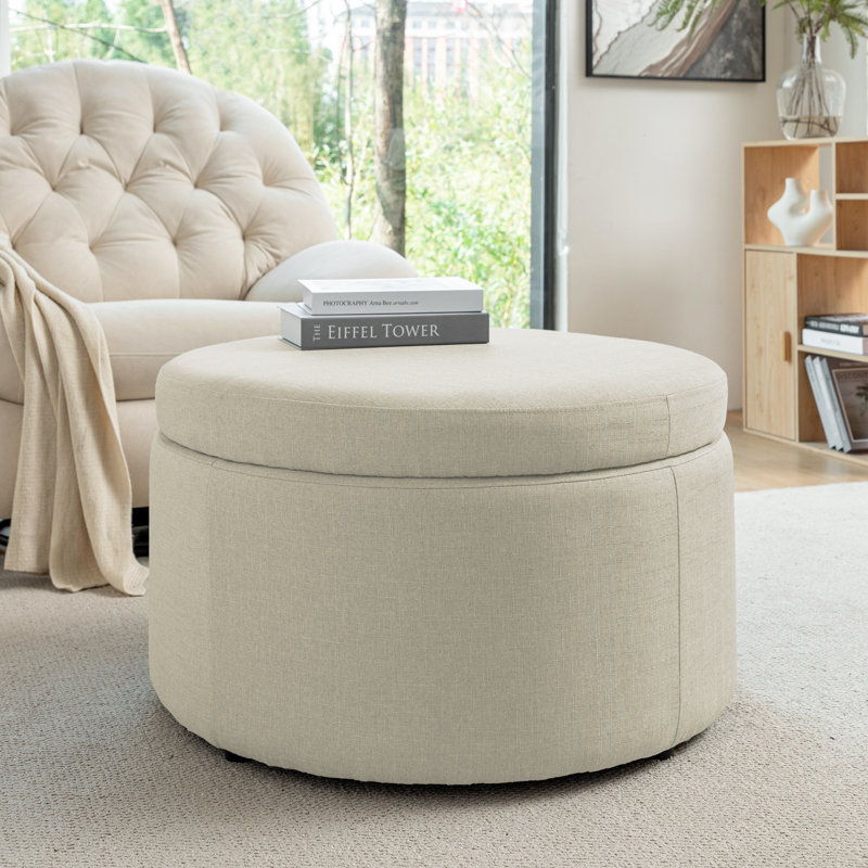 Repose-pieds rond en tissu Gennero, Beige