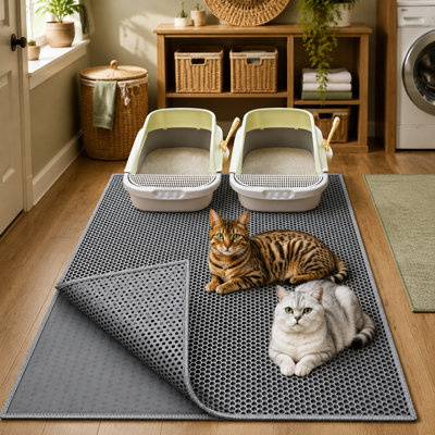 Conçu pour les grands bacs à litière, ce tapis gris double couche de 36 x 30 pouces est imperméable et résistant à l'urine, avec un contrôle des projections, une conception antidérapante, une construction durable, un nettoyage facile, une surface douce pour les pattes et une conception sûre et inodore.