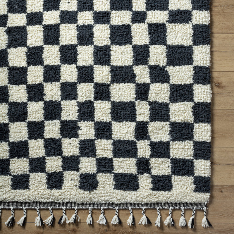 Black and Ivory Geometric Wool Rug with Tassels