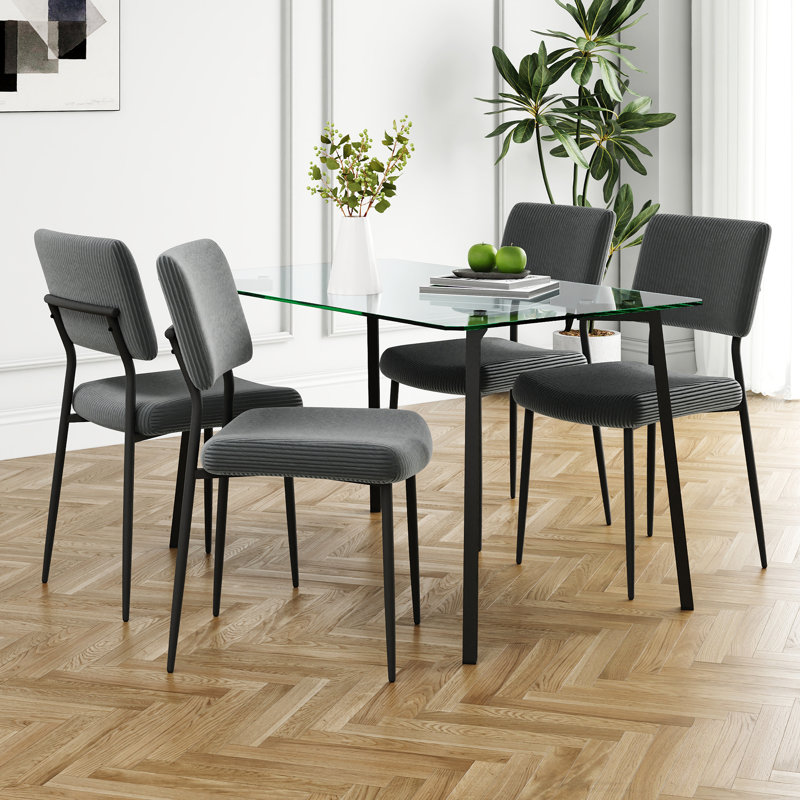 This Five-piece Set Includes A Modern Tempered Glass Table And Four Chairs For A Four-person Square Glass Dining Room, As Well As A Tiny Kitchen Table And Chairs That Are Ideal For Small Rooms Or Apartments.