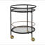Chariot-bar rond moderne avec tablettes en verre trempé et accents dorés