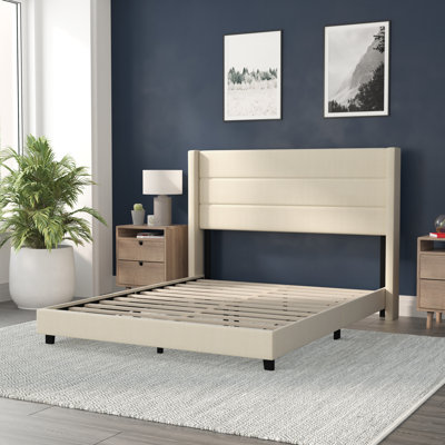 Lit plateforme tapissier avec tête de lit à oreilles et sommier à lattes