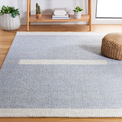 Tapis bleu clair / ivoire Natura 324