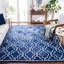 Tapis bleu / ivoire en laine touffeté à la main Deschamps-1897912899