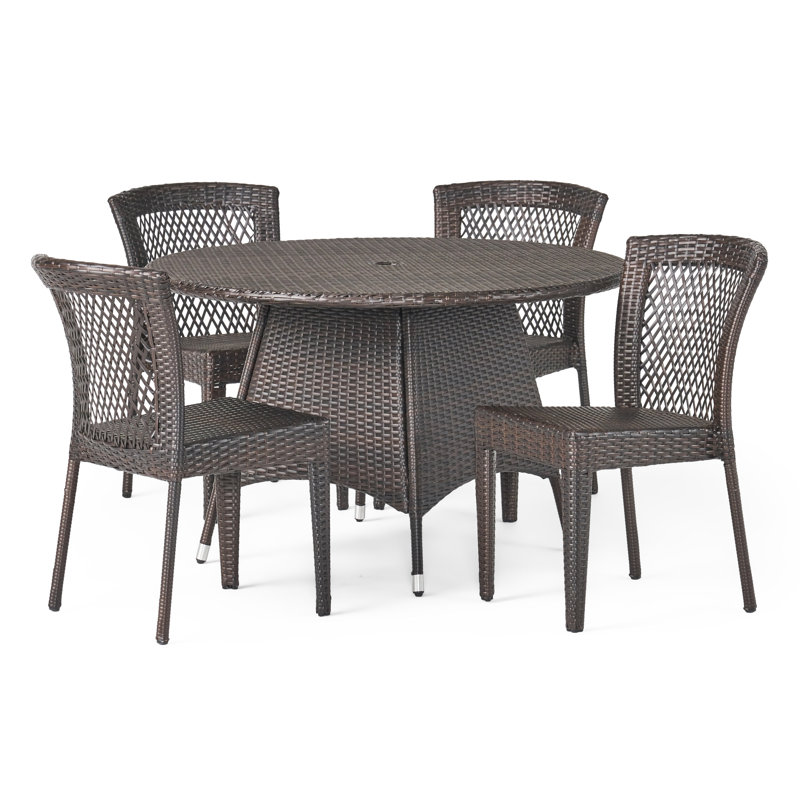 Aonghas 4 - Person Wicker Patio Dining Set with Round Table , Cushions Included