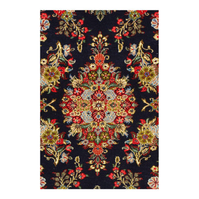 Mettie Oriental Area Rug in Dark Blue