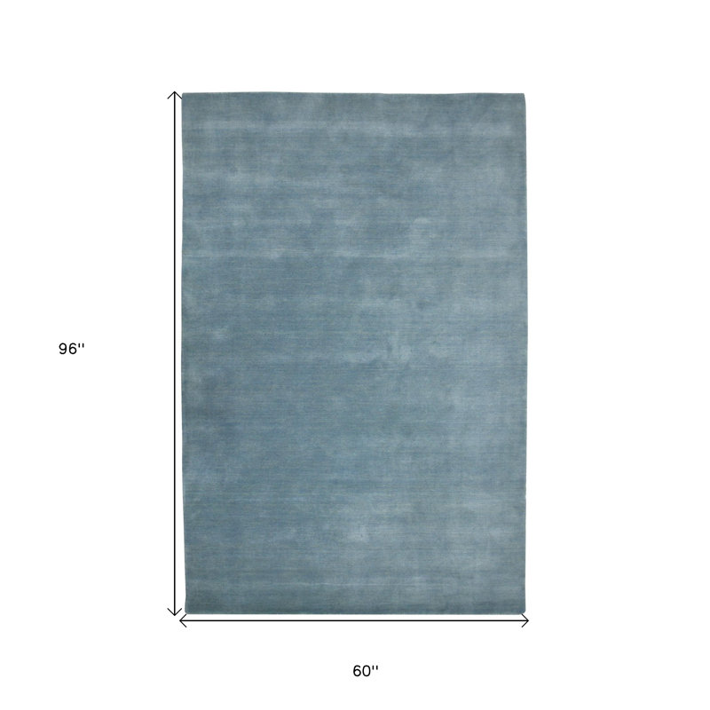 Tapis bleu clair en laine tissé à la main 5 pi x 8 pi