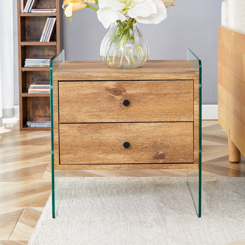 Double-drawer bedside table. The board surface is MDF with wood grain sticker, and both sides are transparent tempered glass. The design is simple and elegant, with excellent storage functions.