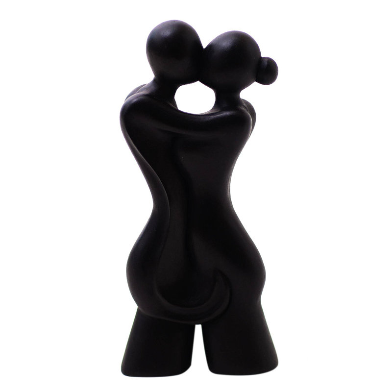 Sculpture en bois jeune couple