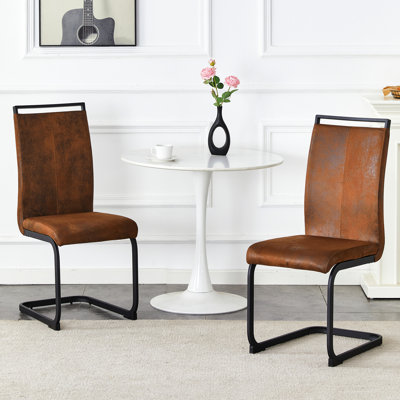 Chaises de salle à manger en suède de style rétro en tissu Tech, pieds en métal robustes pour des espaces de salle à manger intimes. Dossier arqué ergonomique + structure en métal renforcé. Ensemble de 2.