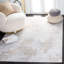 Tapis gris / doré à motif abstrait Kornegay-1659136845