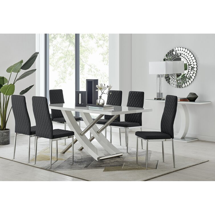 Eubanks Stainless Steel, High Gloss Dining Table Set with 6 Luxury Faux Leather Dining Chairs