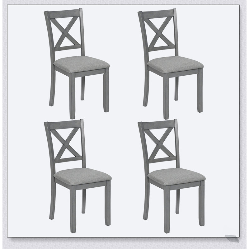 Ensemble de chaises de salle à manger élégantes pour 4 avec sièges rembourrés, dossiers confortables et fabrication robuste pour un décor moderne et traditionnel.