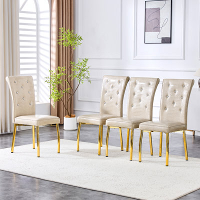 A set of 2 beige and gold vintage crocodile leather cushioned dining chairs, featuring crystal clasp design and artificial leather design, adding a touch of elegance and mystery to the dining area