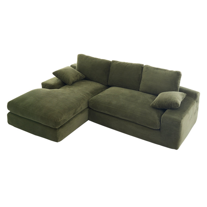 Canapé en velours côtelé vert. Il a une sensation d'assise douce et agréable pour la peau, ajoutant une atmosphère de guérison au salon chaleureux. Il est livré avec 3 coussins de dossier et 2 coussins décoratifs.