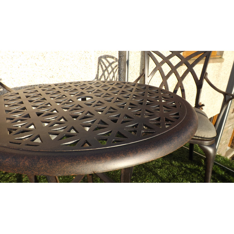 Ryne 2 - Person Patio Dining Set with Round Table , Cushions Included, Bronze
