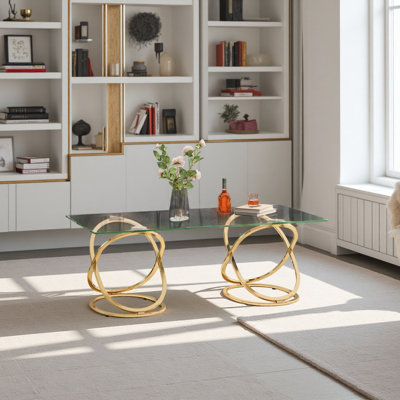 Table basse rectangulaire moderne en verre de 47,24 po avec cadres en forme d'anneau, structure en métal et verre trempé transparent