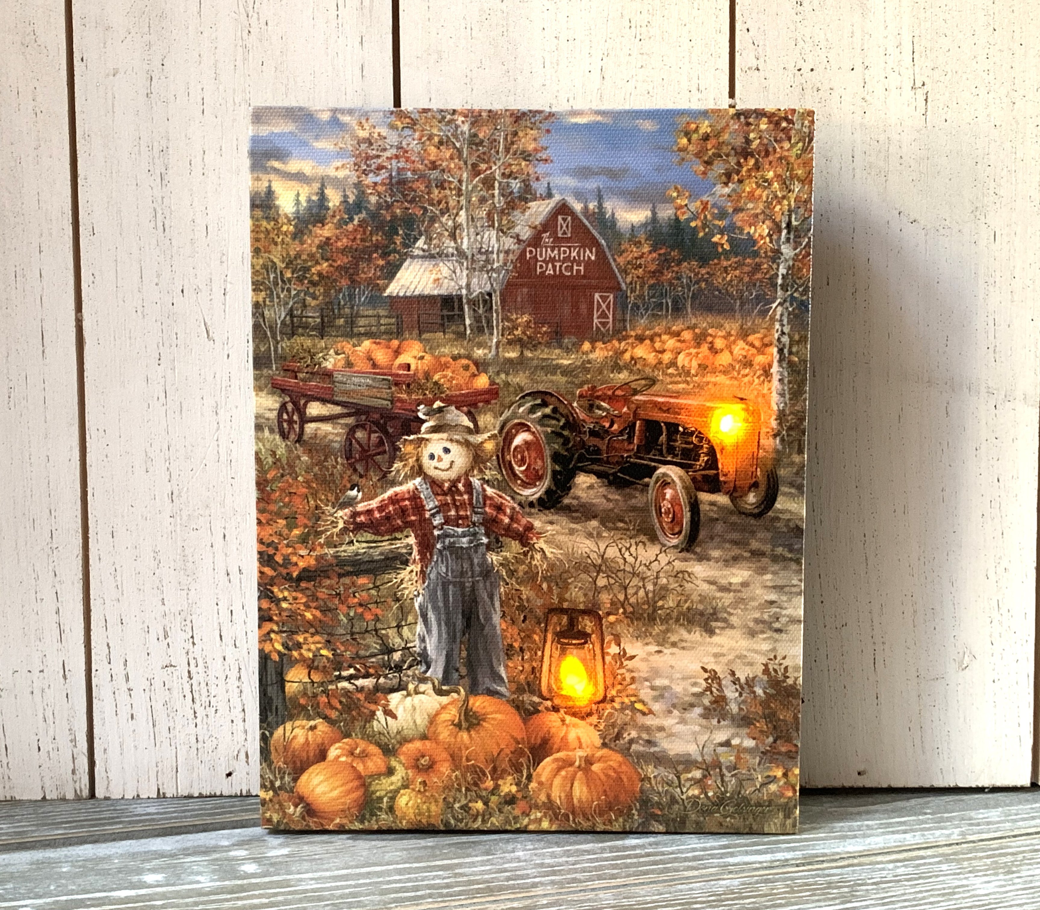 https://assets.wfcdn.com/im/18690349/compr-r85/1401/140168465/mini-lighted-easel-back-canvas-8x6-pumpkin-patch.jpg