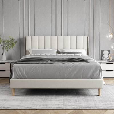 Upholstered Wingback Bed