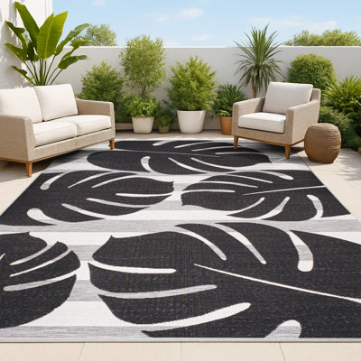 Tapis d'intérieur / extérieur noir / gris Colgin Classic Beach Stripe and Monstera Leaf