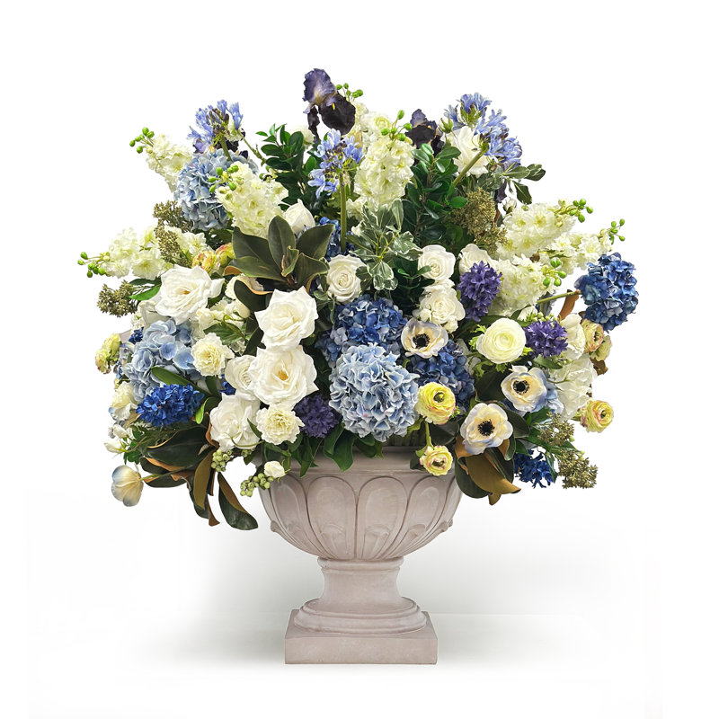 Delphiniums And Roses In Classic Urn
