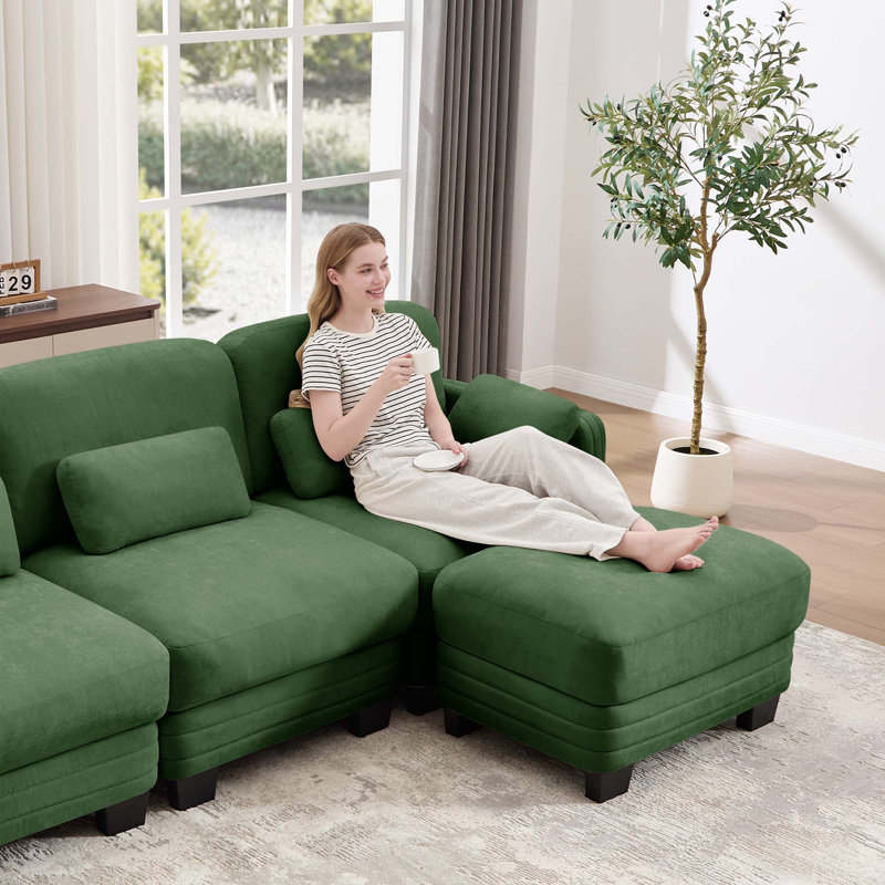 Canapé d'angle modulaire capitonné avec pouf amovible