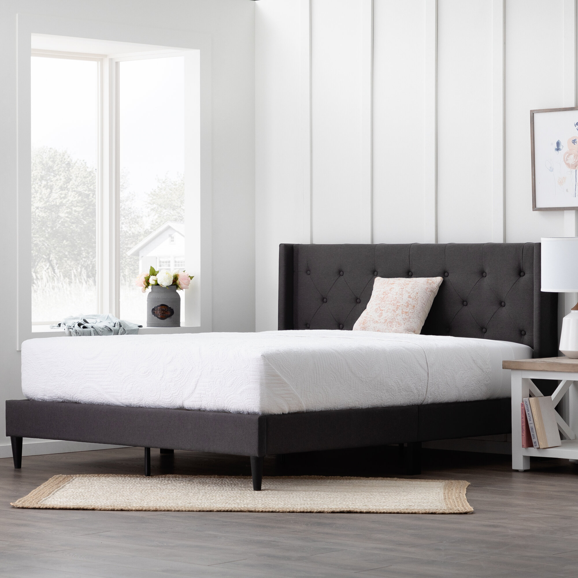 Petersen solid wood tufted low profile store platform bed