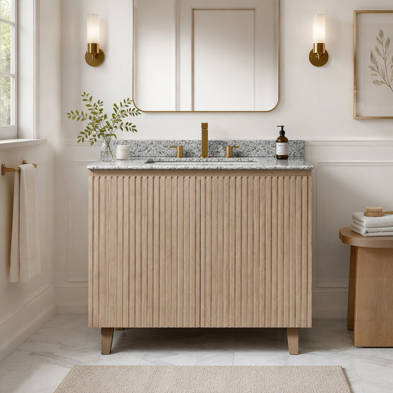 Meuble-lavabo avec comptoir en granit, lavabo en céramique et finition imitation bois Heidelberg pour une salle de bain élégante et fonctionnelle.