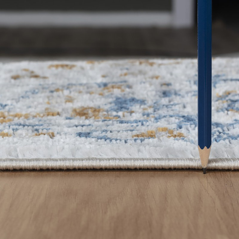 Legacy 5' x 7' Multicolor Stain-Resistant Synthetic Area Rug