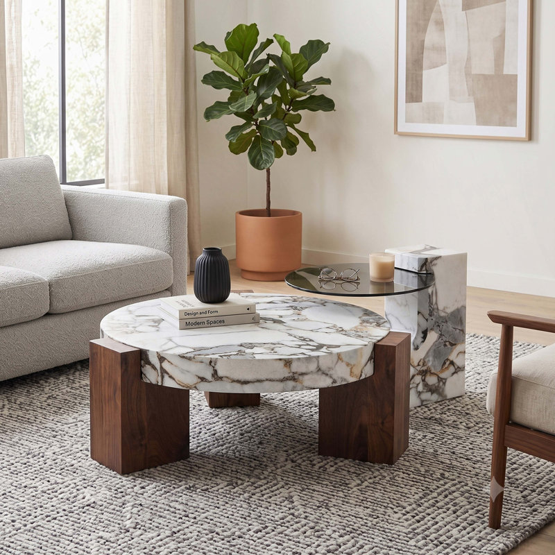 Ensemble de deux tables basses gigognes au design élégant et original ; leur conception détachable permet une utilisation plus flexible de l'espace et convient à divers environnements.