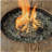 Circular propane pit table with lava rock