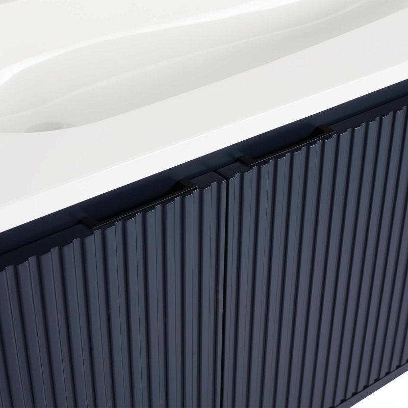 Meuble-lavabo flottant avec lavabo en résine en forme de goutte