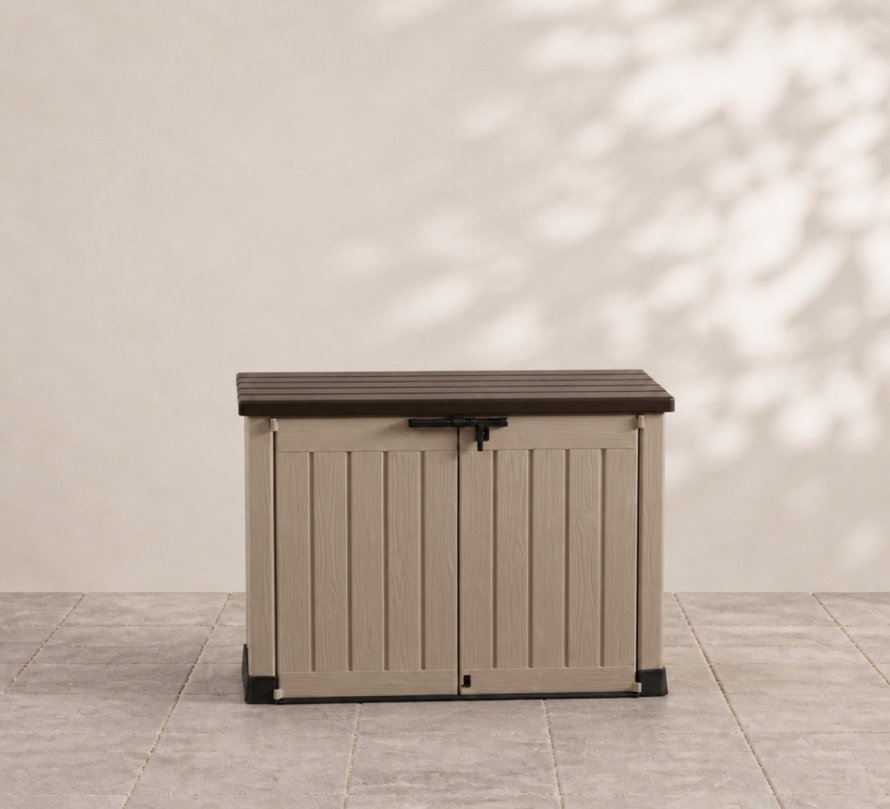 Beige outdoor garden storage box with a dark brown lid and double doors on a tiled patio.