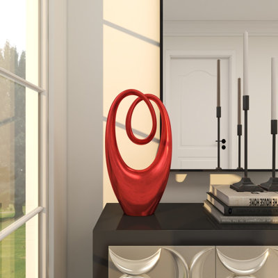 Abstract red polystone sculpture