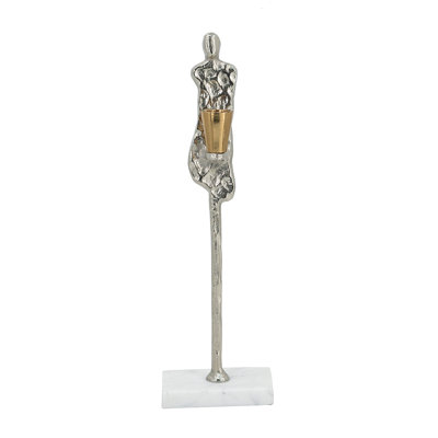 Porte-bougie fuselé en aluminium à motif humain abstrait et support en marbre