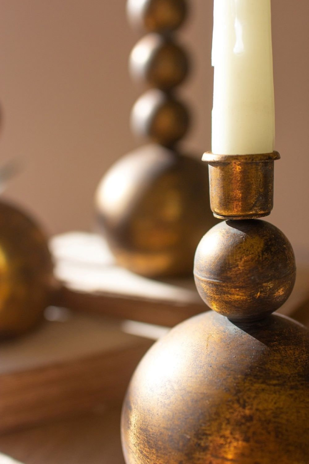 SET OF THREE ANTIQUE BRASS TAPER CANDLE HOLDERS
