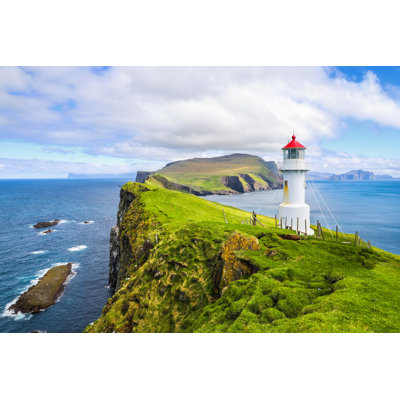 Iconic Red And White Lighthouse On Mykines Island by Try Media - Wrapped Canvas Print