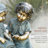 Girl and Boy Reading Statue