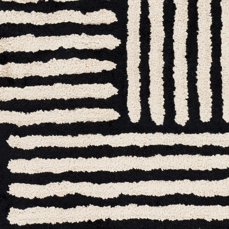 Balos Hand Tufted Black/Ivory Rug