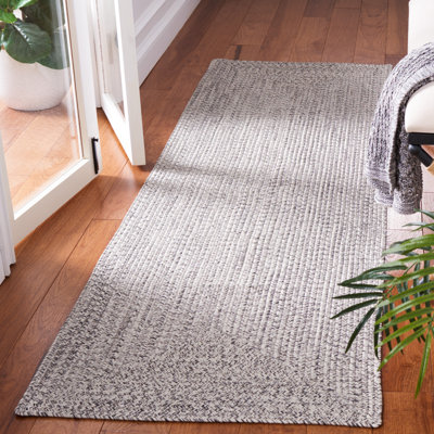 Tapis bleu foncé / ivoire tissé à la main Trombetta